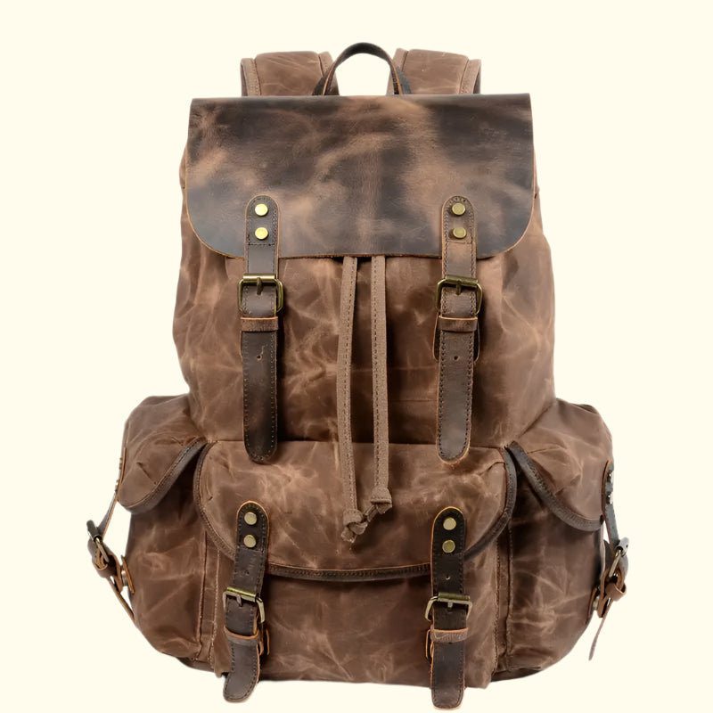 Brown leather backpack with straps on a white background