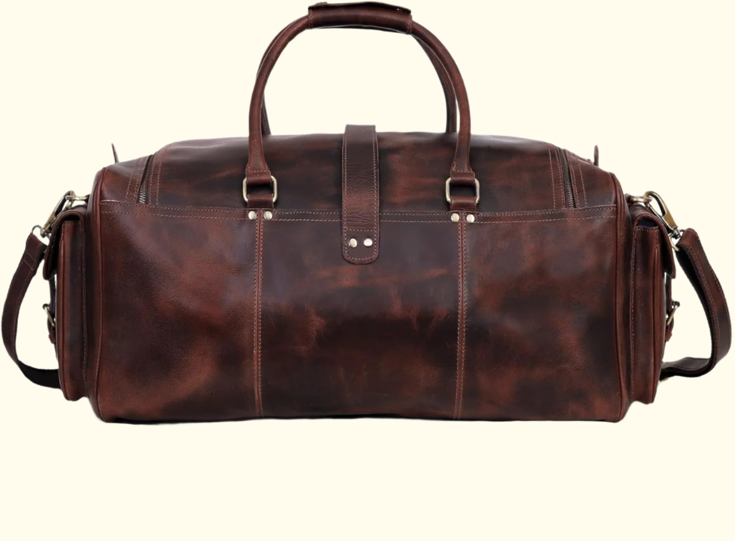 Brown leather duffel bag on a white background