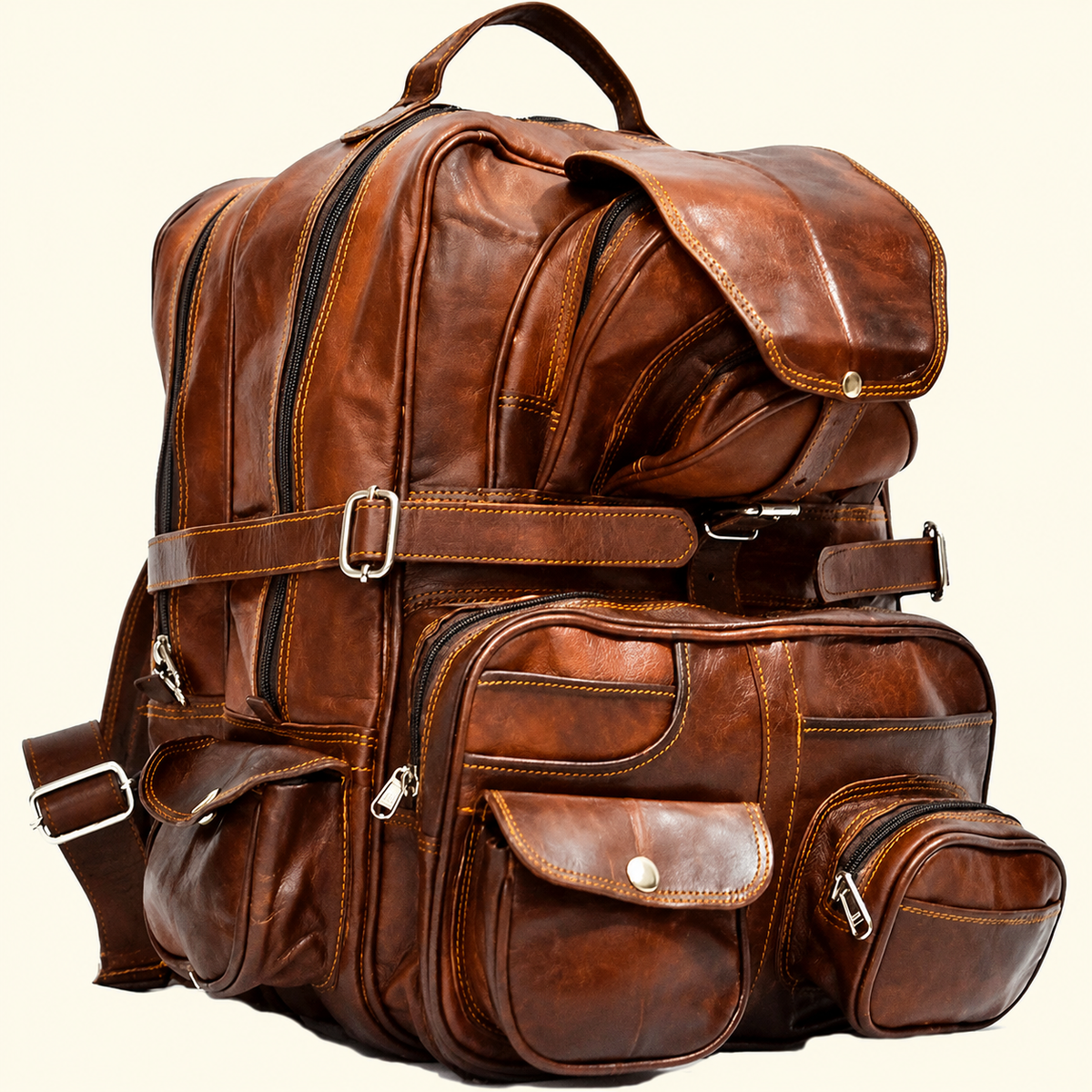 A distressed brown leather backpack with multiple front and side pockets, a top handle, and silver-tone hardware, shown on a plain light beige background.