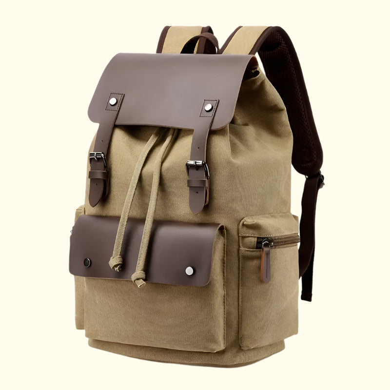 Beige backpack with brown leather accents on a white background