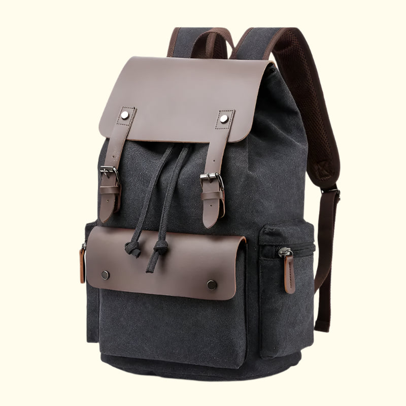 Gray backpack with brown leather accents on a white background