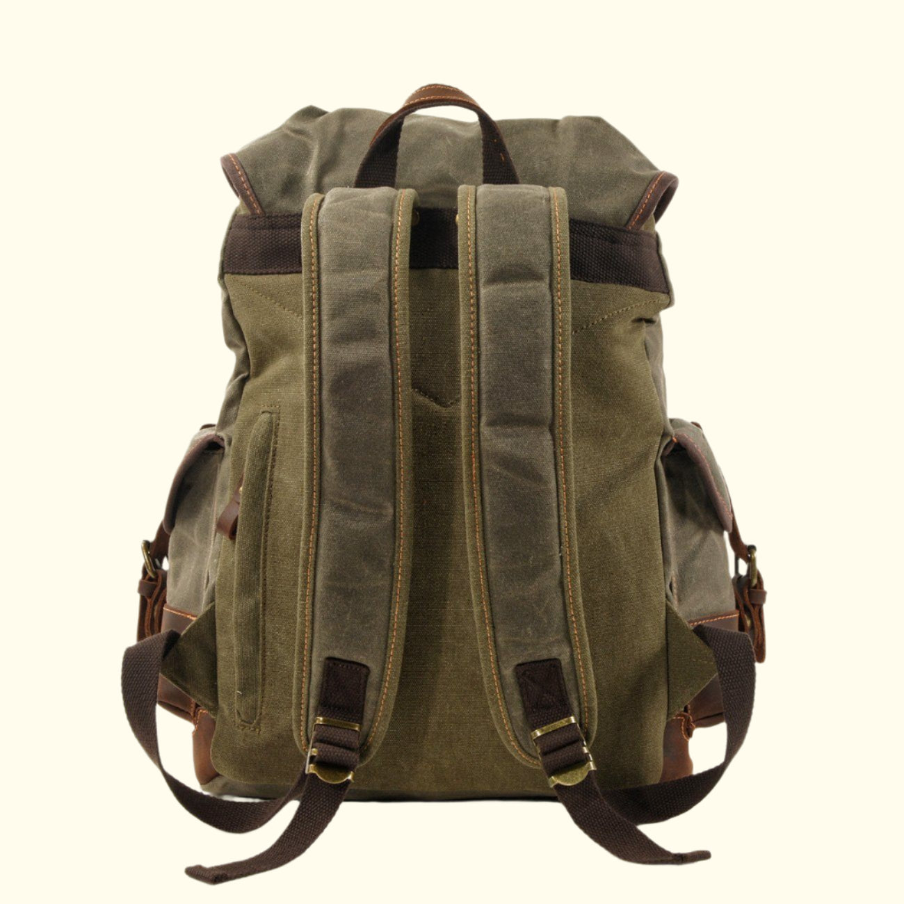 Green backpack with brown straps on a white background
