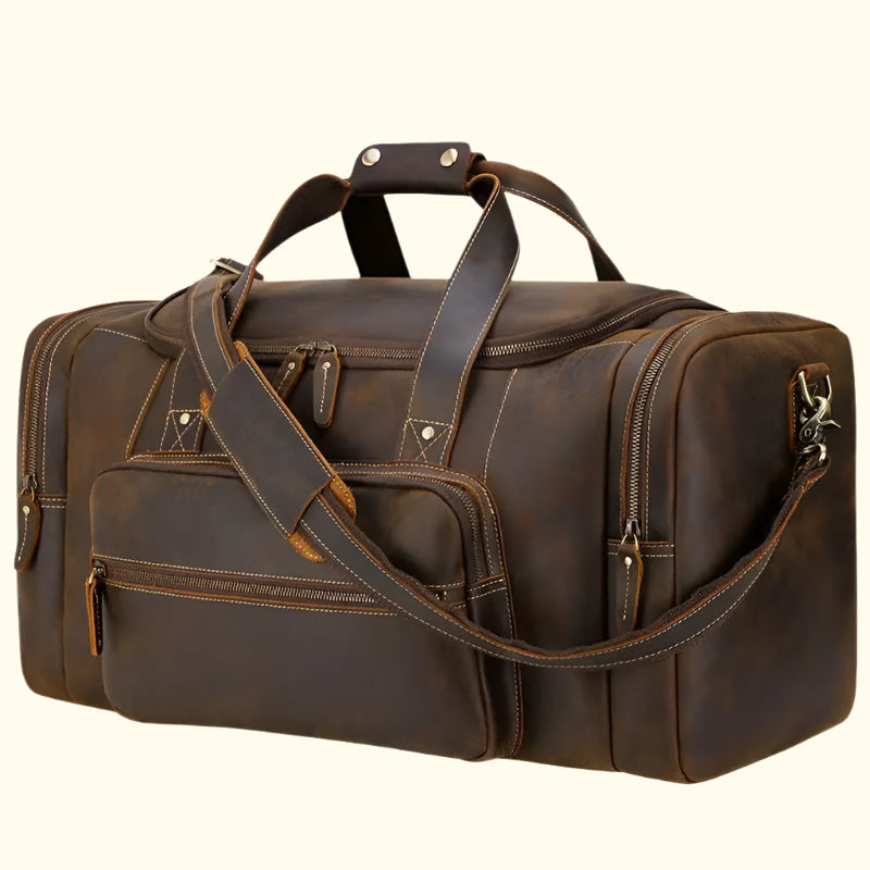 Brown leather duffel bag with multiple zippers on a white background