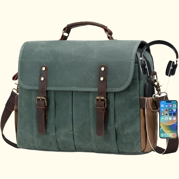 Green leather satchel bag with a phone and headphones on a white background