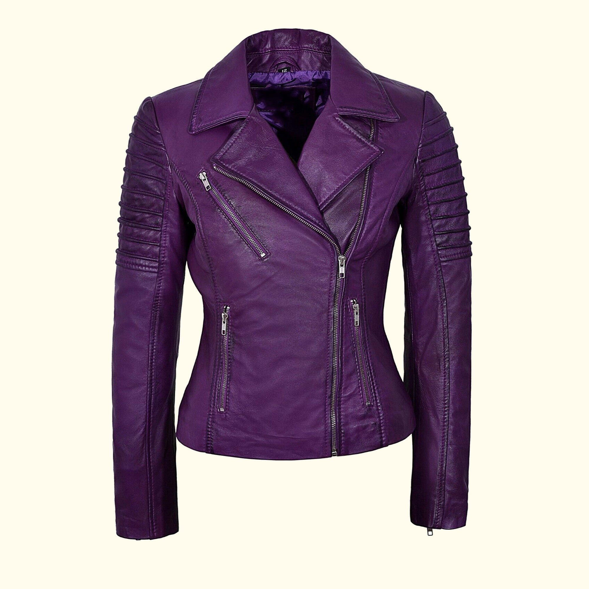 A purple sheep leather jacket with asymmetrical zipper, zippered pockets, and ribbed detailing on the sleeves.