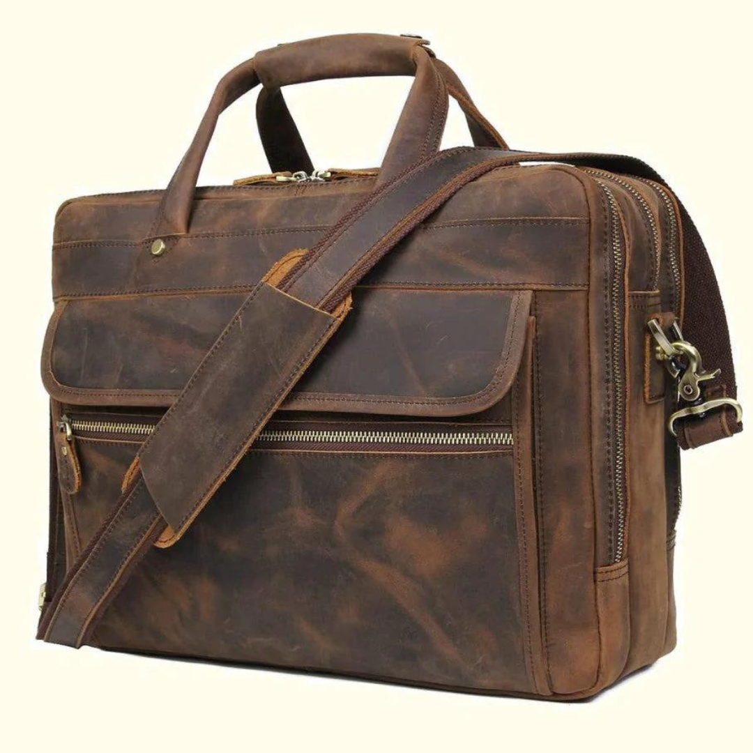A brown Monterrey Buffalo Leather Business Briefcase with a shoulder strap and zipper closure.