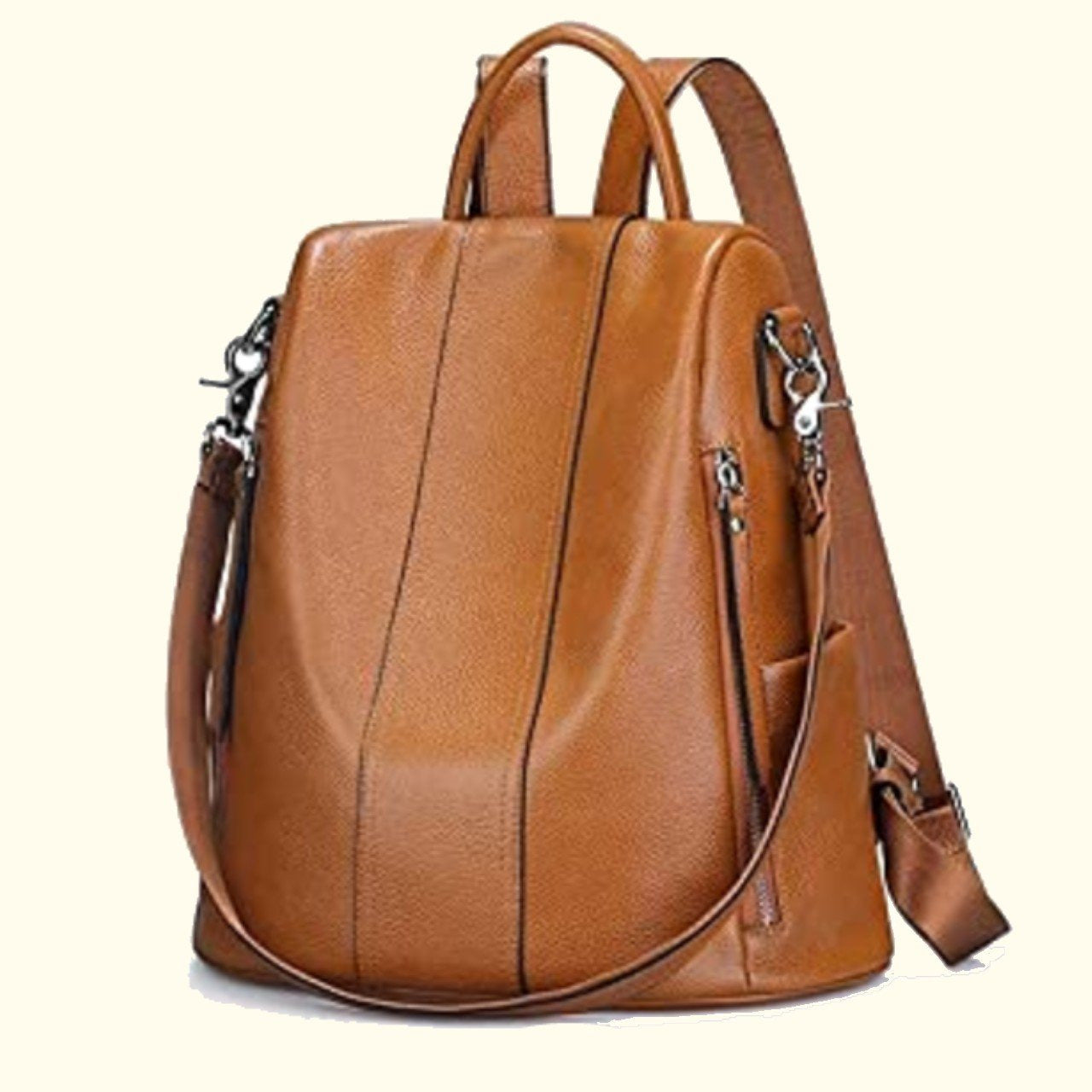 A brown, soft genuine leather backpack with premium quality zippers, satin lining, and a detachable strap.